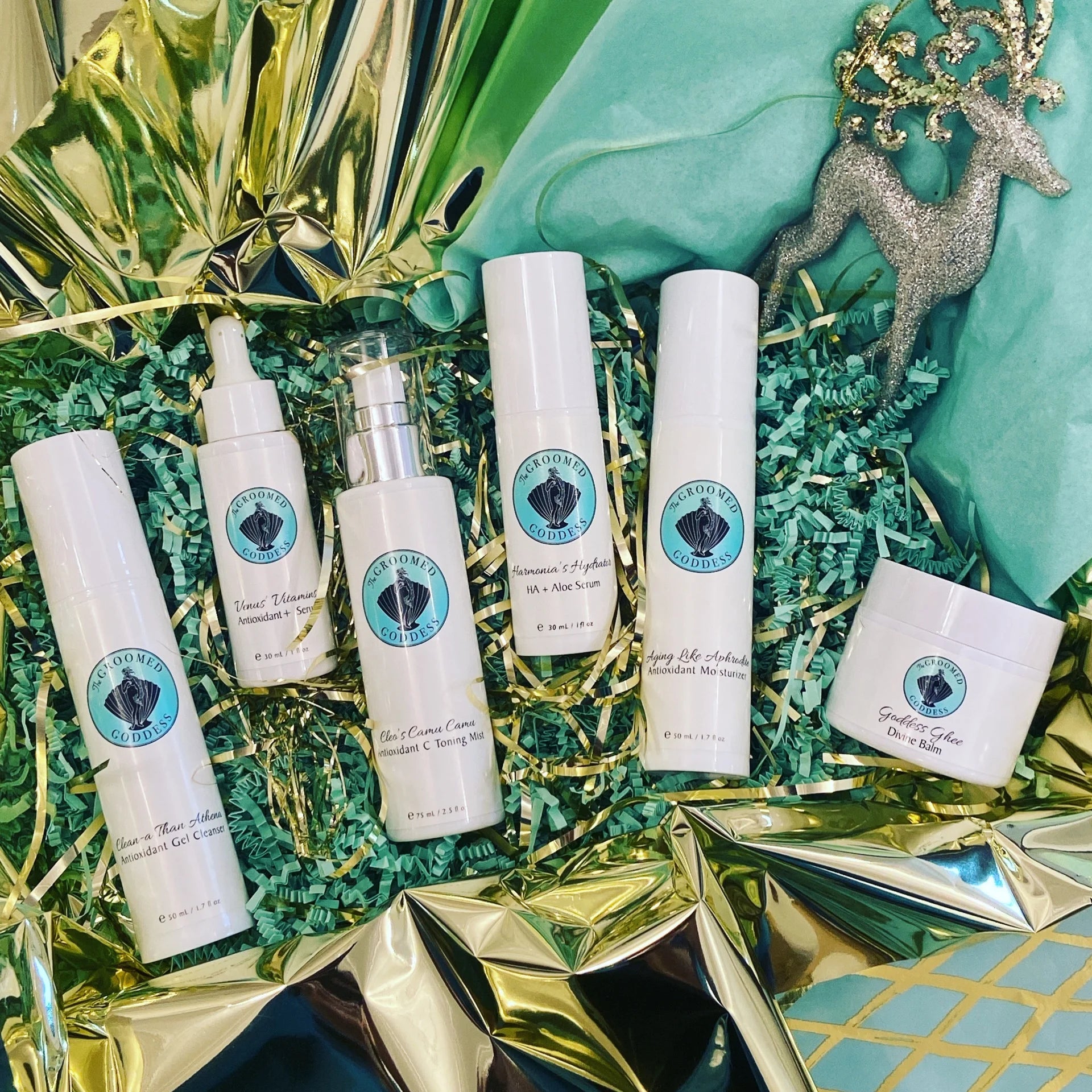 Set of skincare products with a brand logo on a decorative background